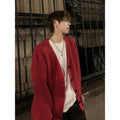 Men's solid colour V-neck cardigan sweater in a loose casual fit.