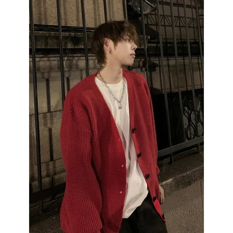 Men's solid colour V-neck cardigan sweater in a loose casual fit.