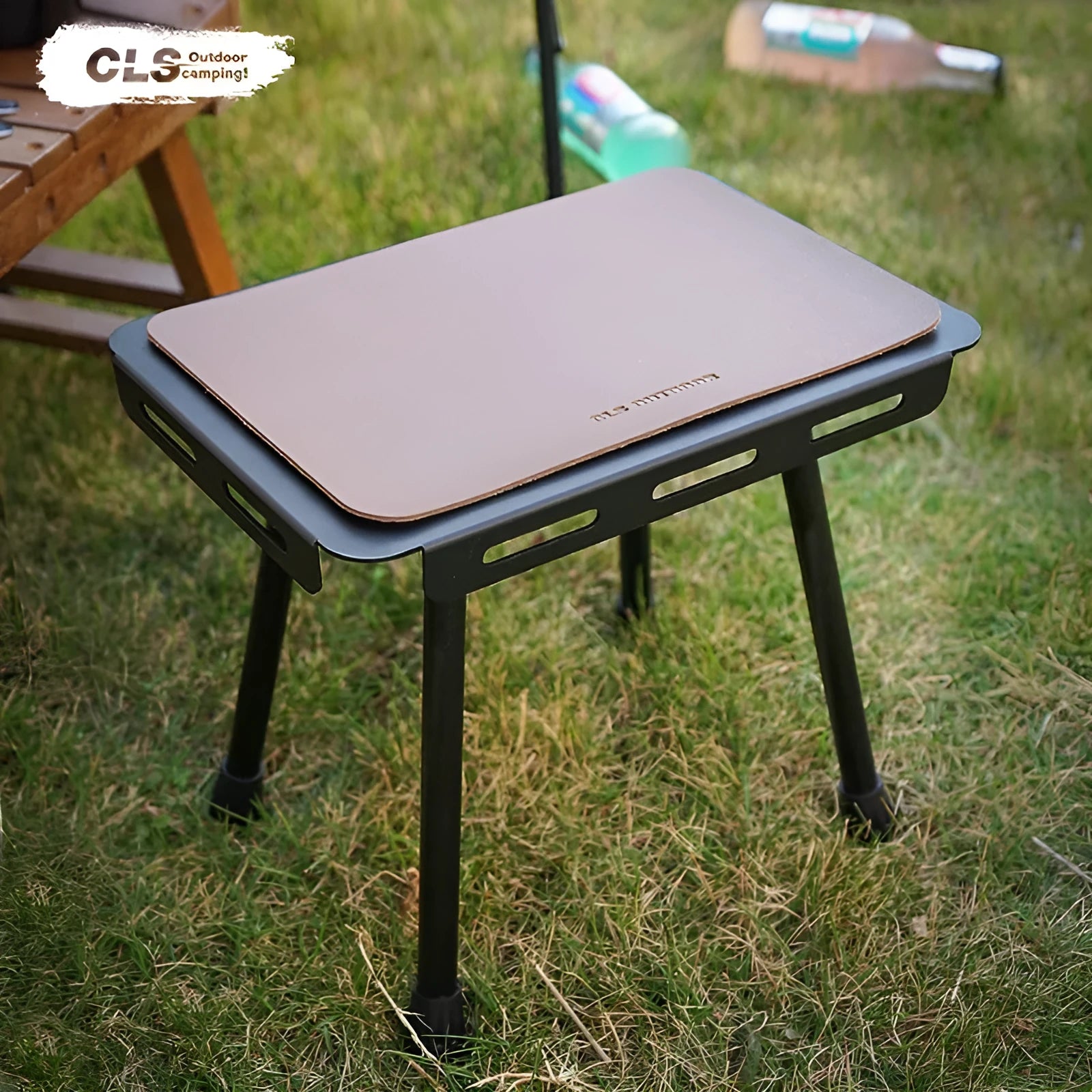 CLS aluminium folding camping stool shown in army green, converted into a small table.