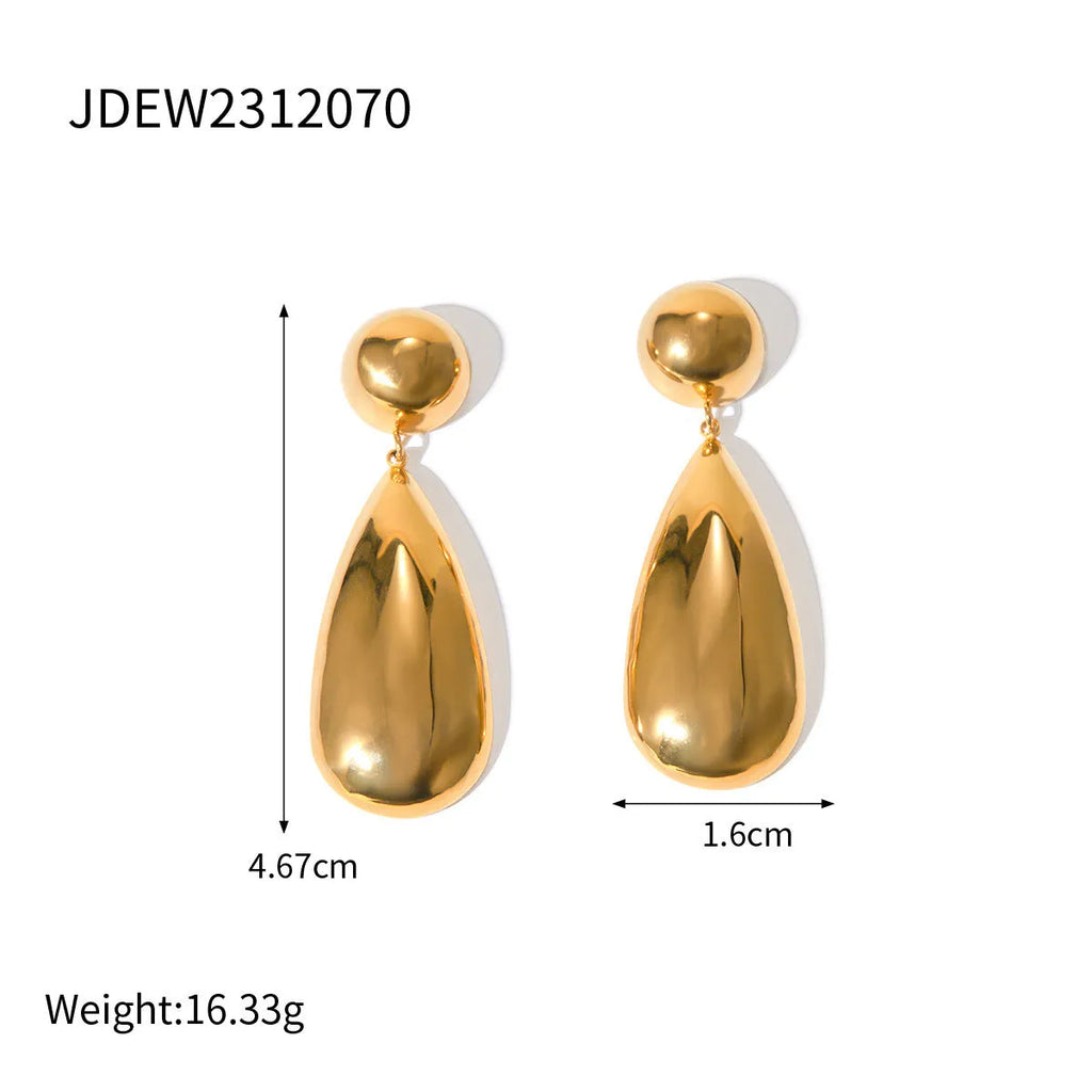 Gold-coloured stainless steel earrings featuring a geometric hemisphere shape with a dangling water drop pendant.