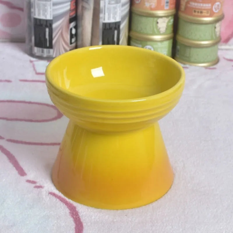 Ceramic pet bowl with high foot design showing anti-tumble stability feature