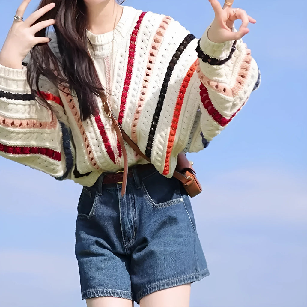 Women's rainbow striped hollow knit sweater with batwing sleeves and round neck in loose fit
