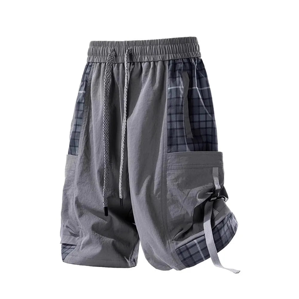Men's loose-fit cargo shorts in grey with plaid stitching and cargo pockets.