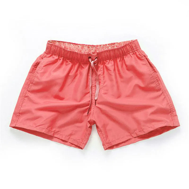 Men's plus-size polyester beach shorts in multiple colours on a size chart background.