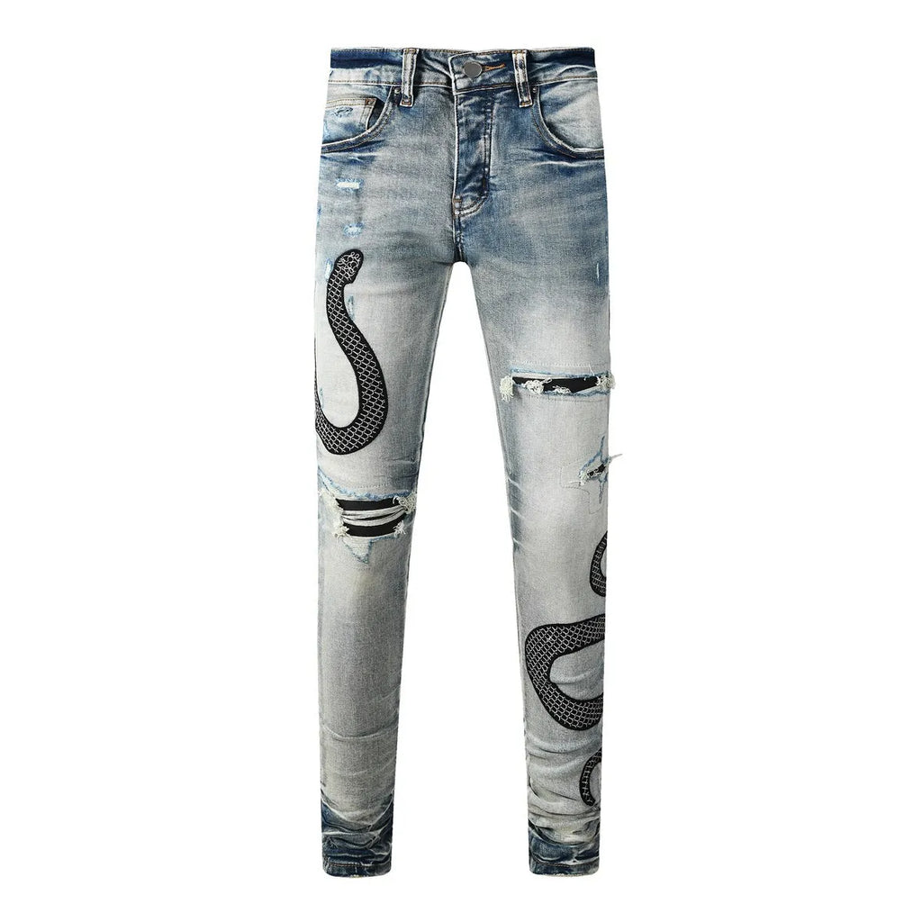 Blue distressed street fashion skinny jeans with a button fly and mid-rise waist on a hanger.