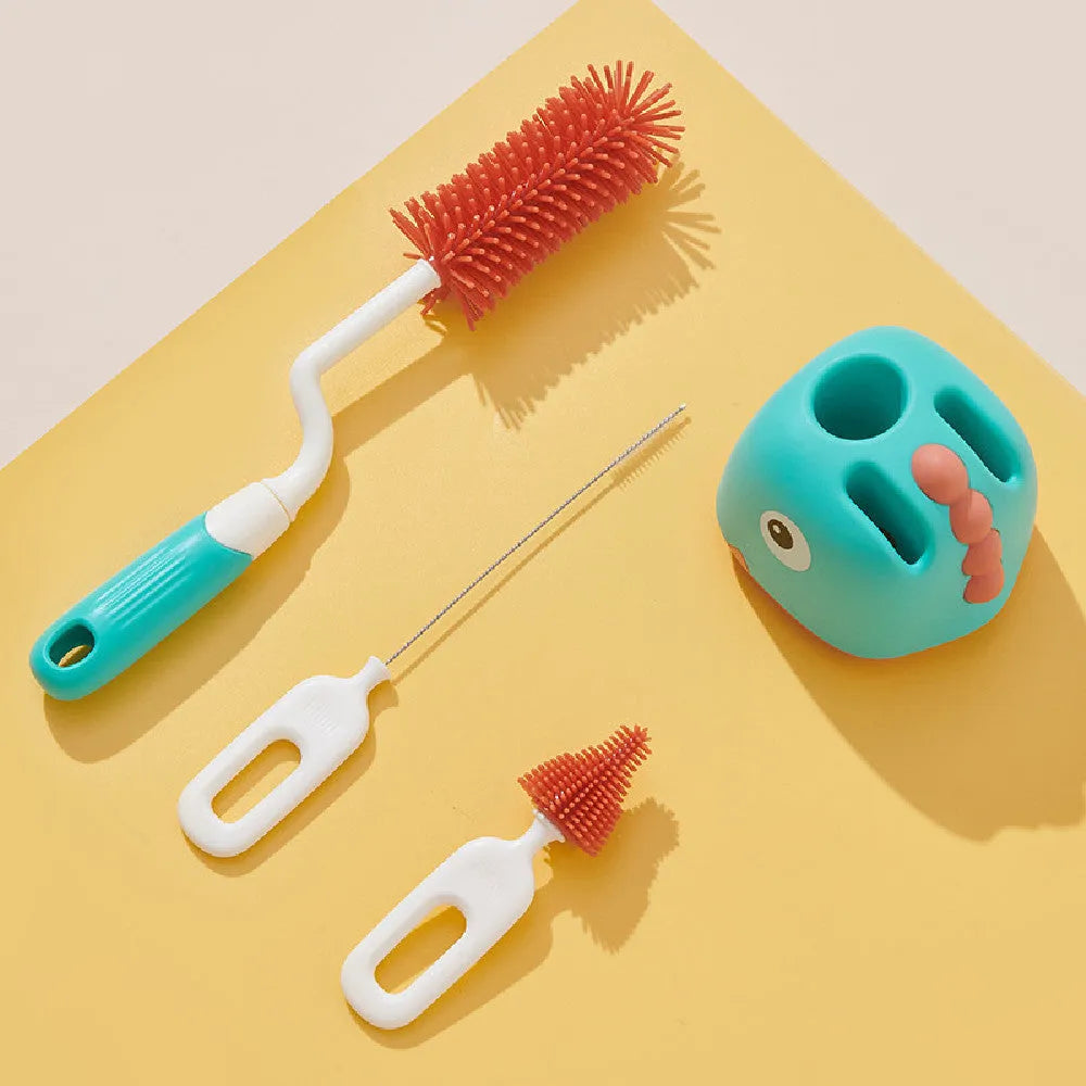 Three multifunctional cleaning brushes in a matching base, amber yellow colour, with PP handles and silicone bristles