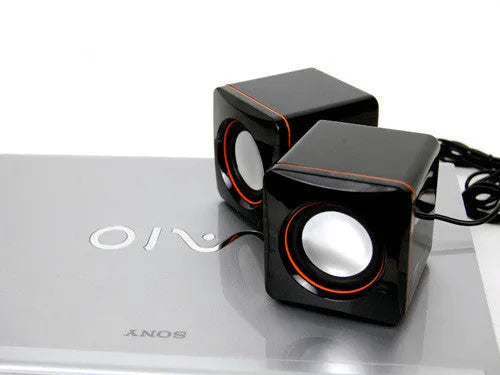 Black square USB-powered 2.0 channel computer speaker for desktop audio enhancement