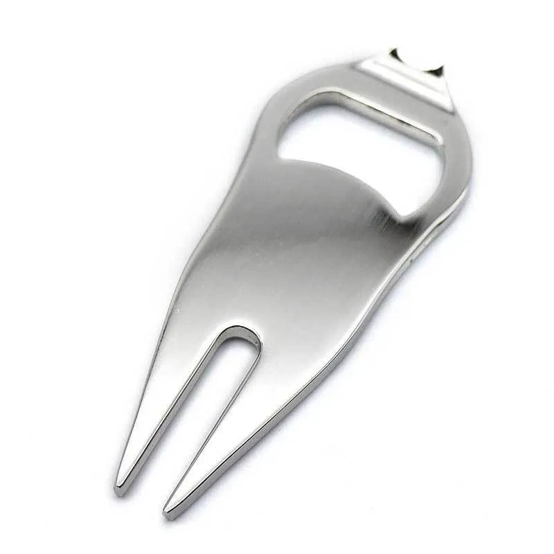 Black zinc alloy golf ball yoke and bottle opener tool with 25mm coin on putting green
