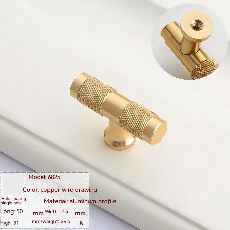 Brushed brass aluminium alloy furniture handle on a white background, showing hole spacing options.