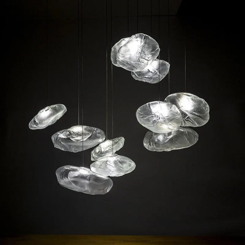 Modern glass decorative chandelier with LED lighting in leisure setting