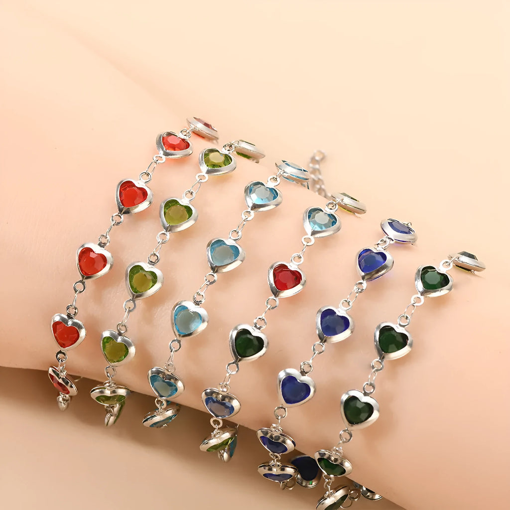 Devil's Eye geometric heart-shaped stainless steel bracelet in an electroplated colour on a wrist.
