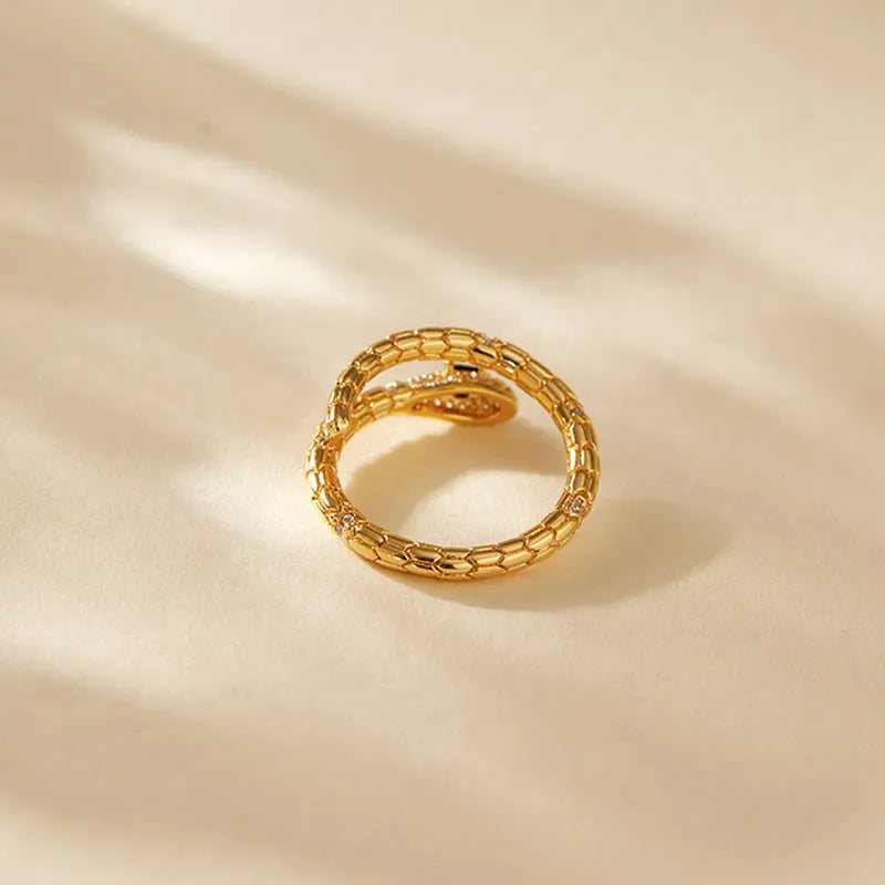 Adjustable copper snake ring with 18K gold colour plating and diamond treatment surface