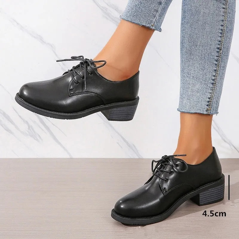 Black women's work shoes with chunky 3-5cm heel and rubber sole