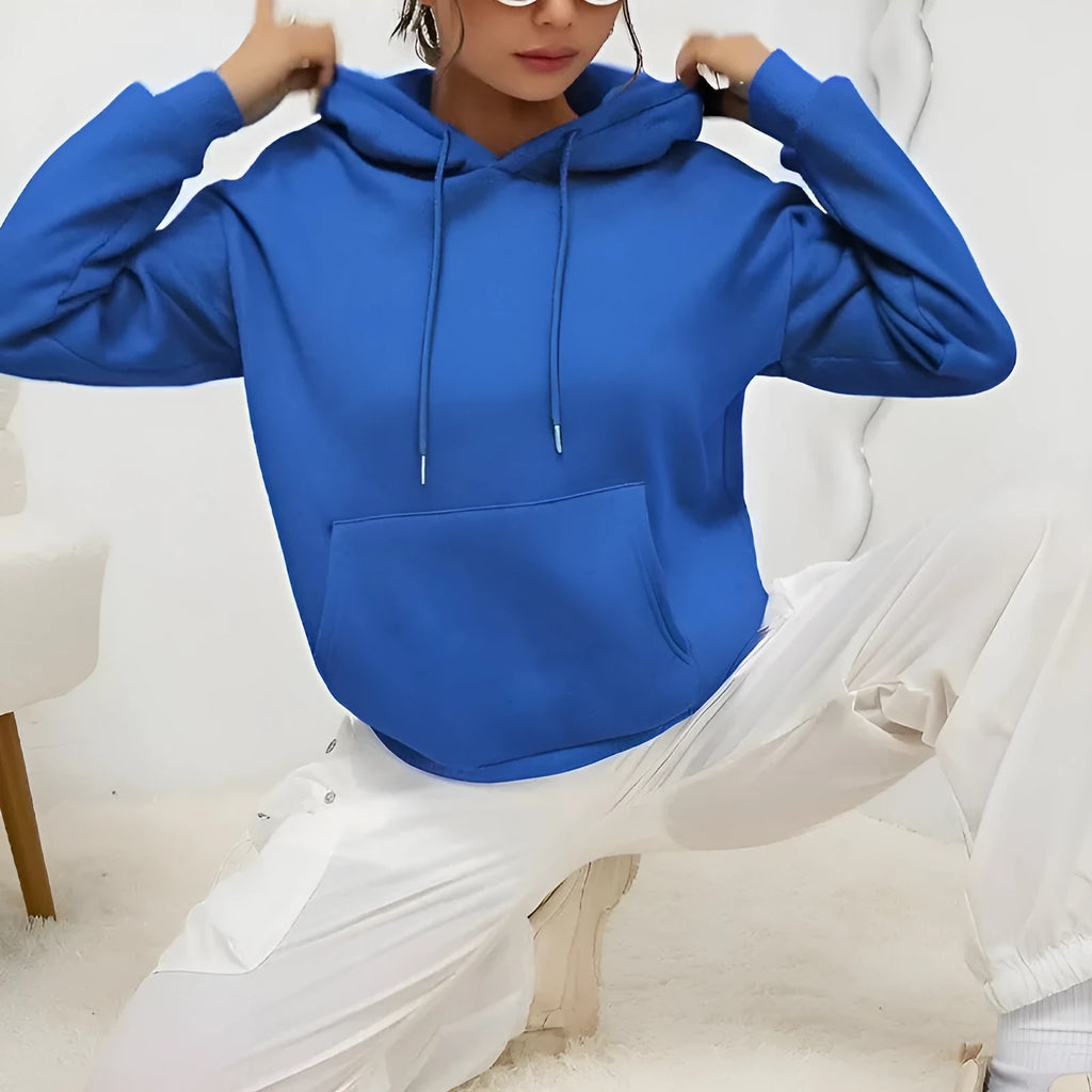 Women's loose grey sweatshirt with drawstring pockets and long sleeves