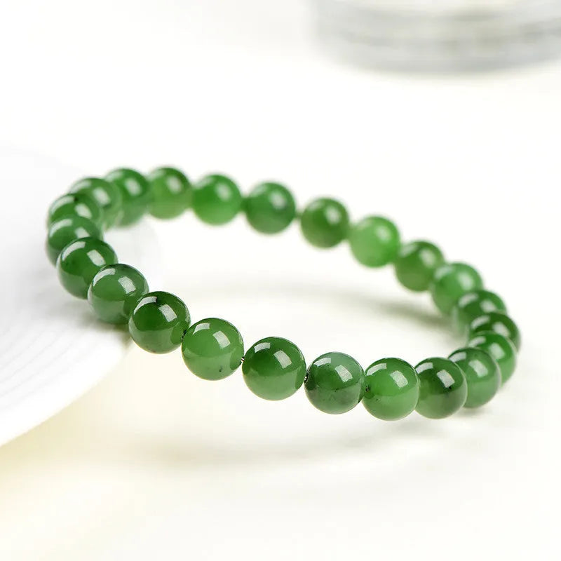 Natural Jasper ball bracelet with polished Hetian jade beads in various size options.