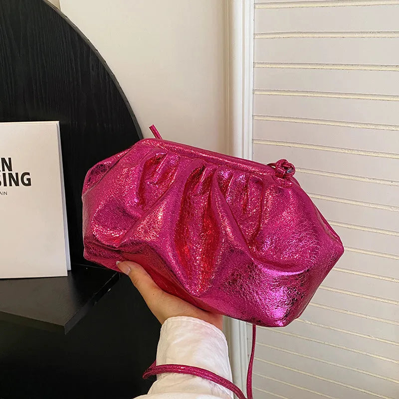 PU shell-shaped crossbody shoulder bag with multiple internal pockets in rose red colour.