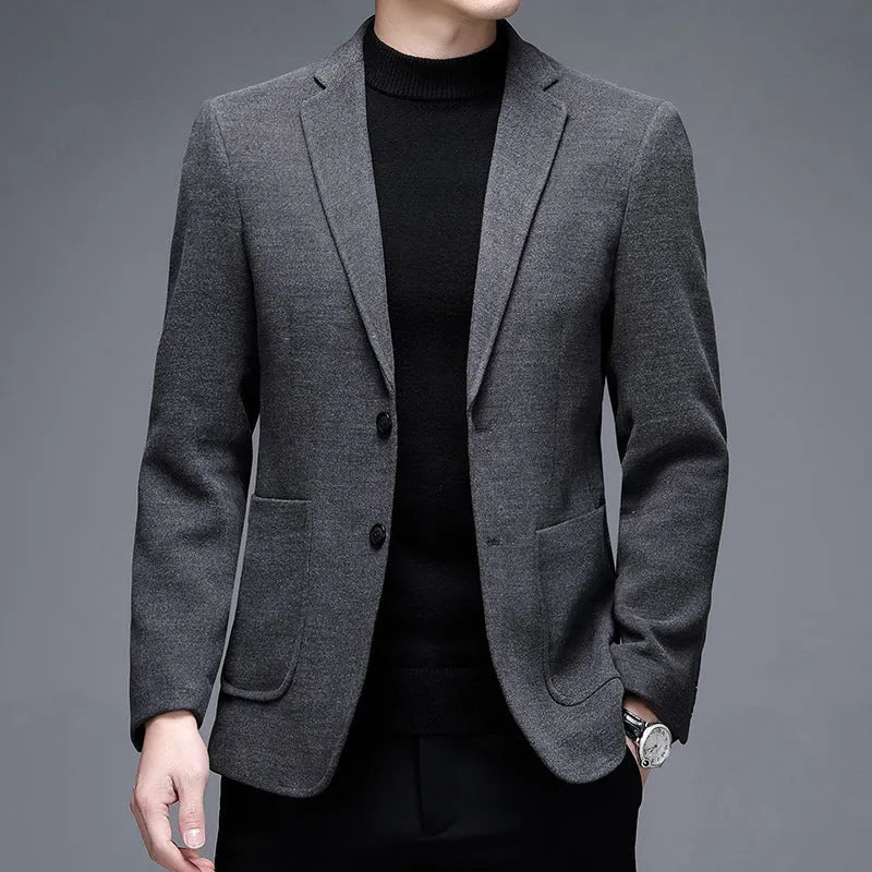 Men's solid colour loose fit woolen winter jacket in grey, shown on a model.