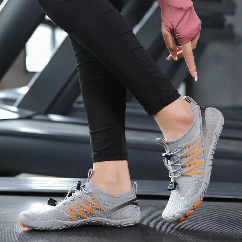 Lightweight low-top indoor fitness training sneakers in various colours with a non-slip rubber sole.