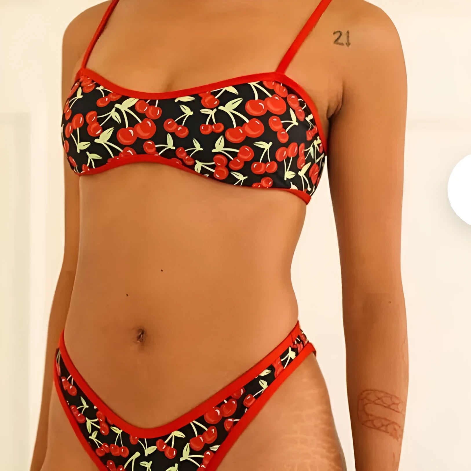 Women's cherry print polyester bikini swimsuit set with tube top and briefs