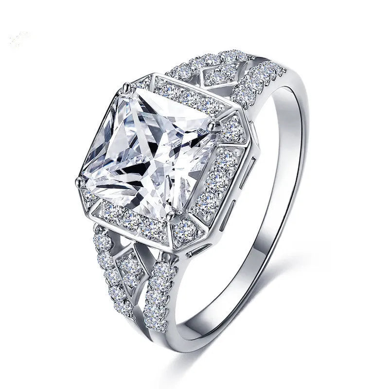 Geometric hollow women's ring with zircon stones in platinum colour