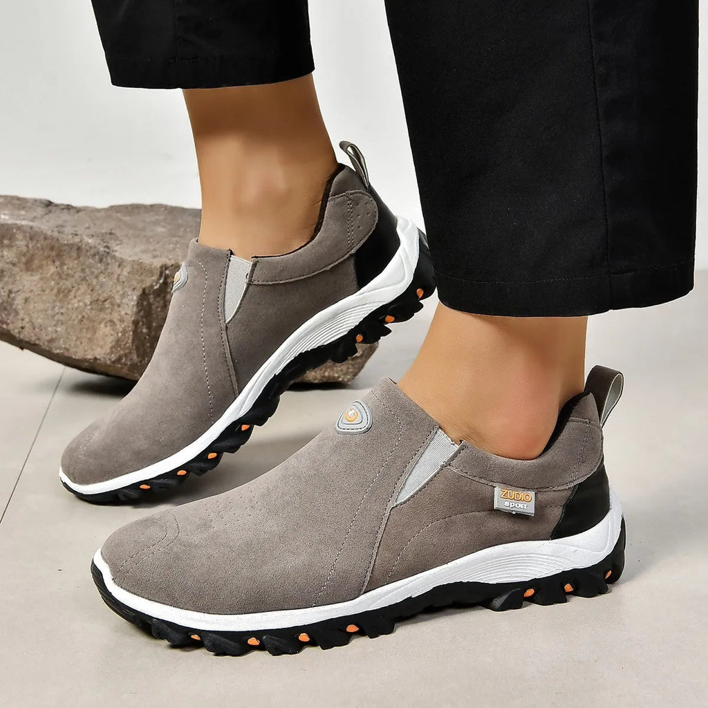 Men's round head thin shoe cover in light brown colour with visible rubber sole and PU upper.
