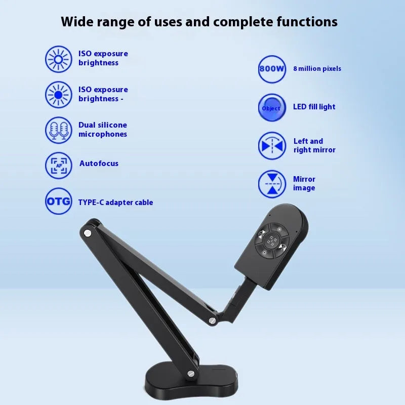 USB computer webcam with microphone for video calls and streaming on a desk.
