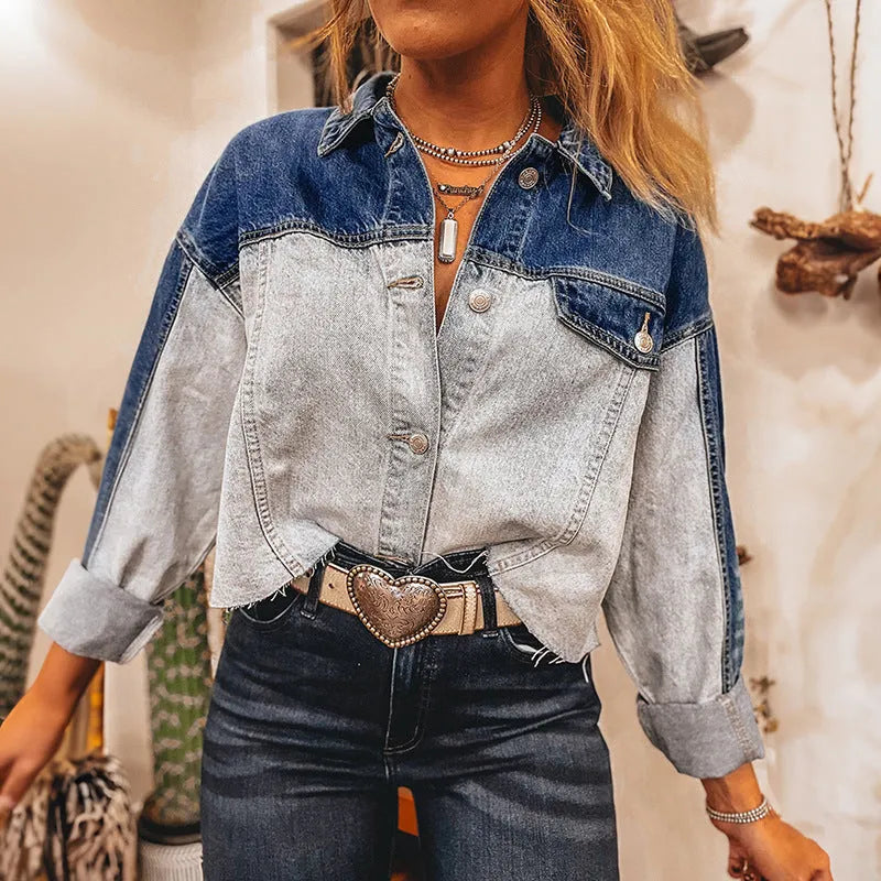 Women's loose-fitting denim coat with multiple buckle fastenings in a single row
