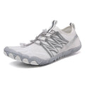 Lightweight low-top indoor fitness training sneakers in various colours with a non-slip rubber sole.