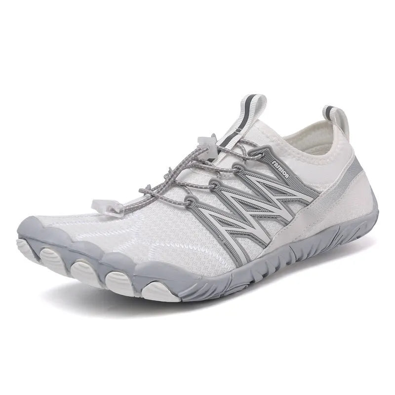 Lightweight low-top indoor fitness training sneakers in various colours with a non-slip rubber sole.