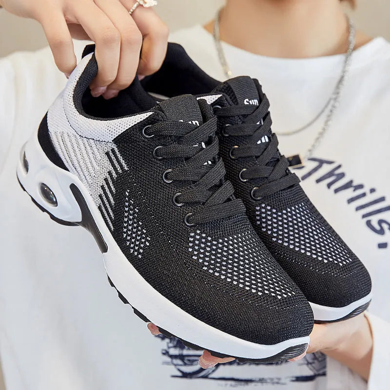 Women's Flyknit casual running shoes with striped pattern and mesh lining in available colours