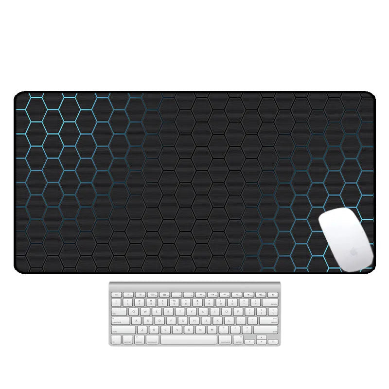 Large geometric pattern desk pad with natural rubber non-slip base on wooden desk