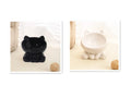 Ceramic cat bowl in black and white with oblique mouth shape on a light background