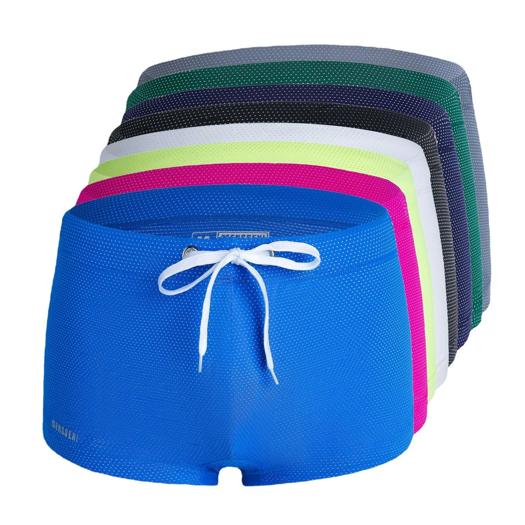 Men's low-waist boxer style swimming trunks in nylon, available in multiple colours.