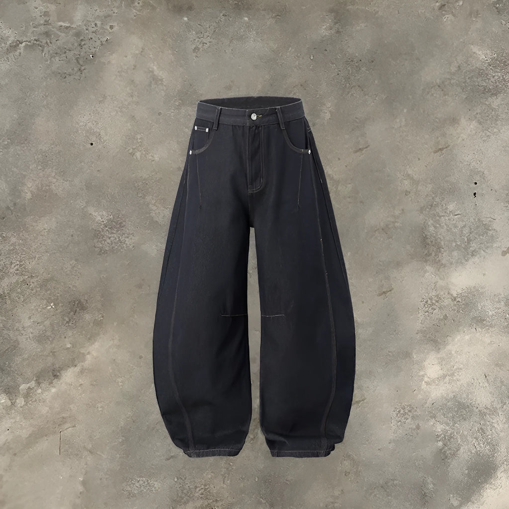 Men's wide leg denim trousers in original cow colour showing relaxed fit and mid waist construction