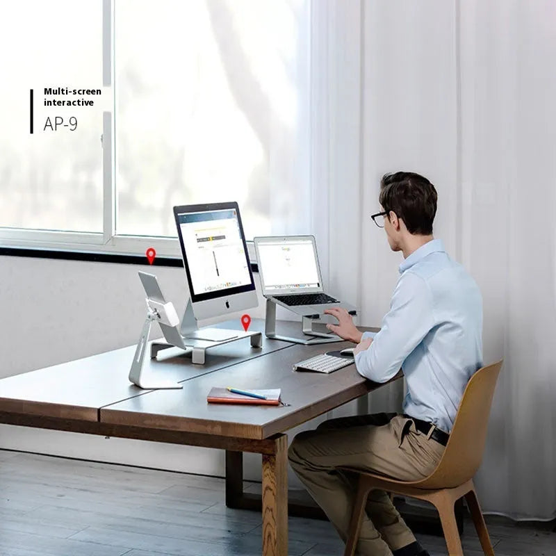 Black aluminium alloy laptop stand on desk with laptop elevated