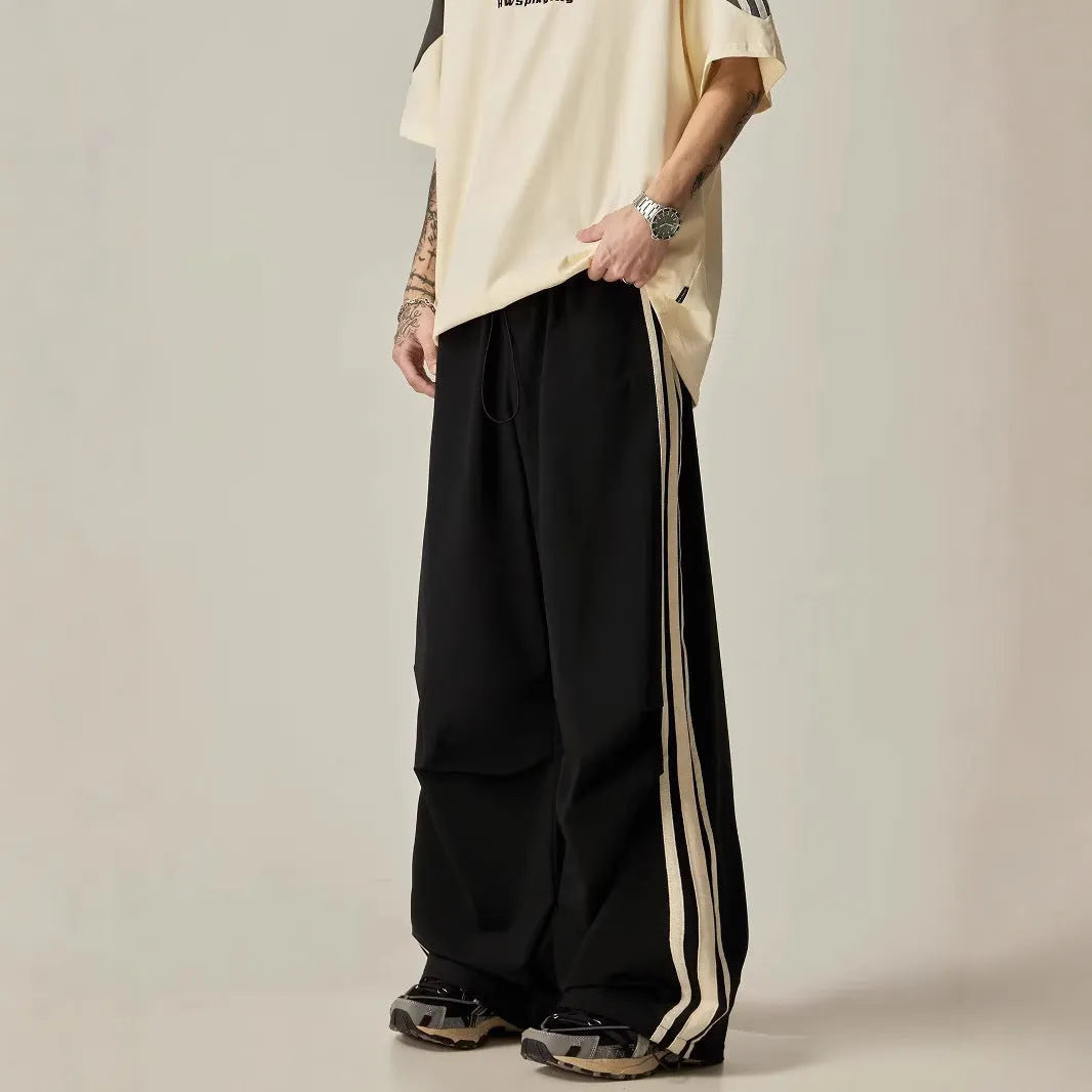 Men's black wide leg climbing trousers with high waist and straight cut in polyester fibre material