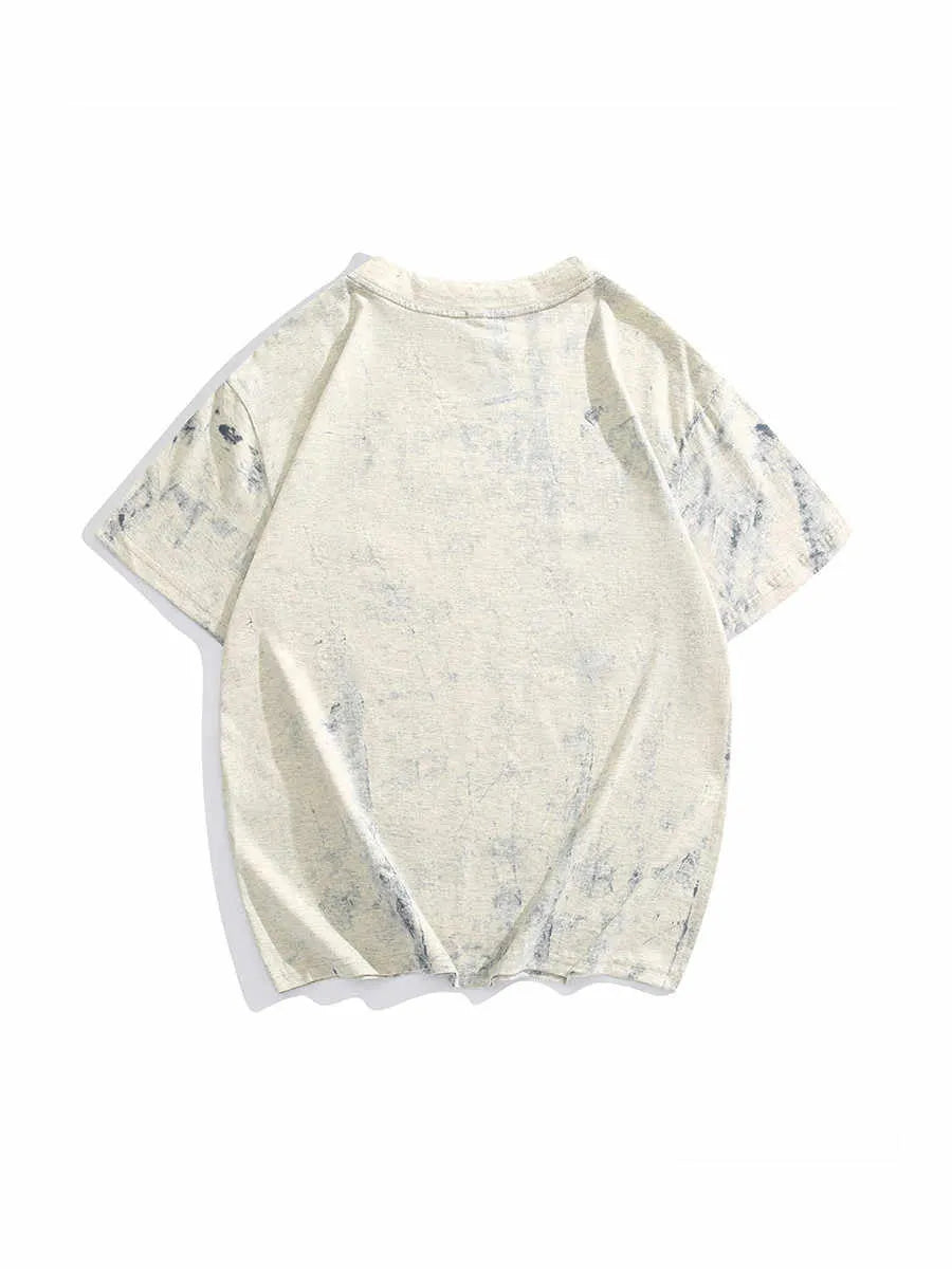 Grey loose fit short sleeve t-shirt with a full body tie dye pattern, showing round neck collar.