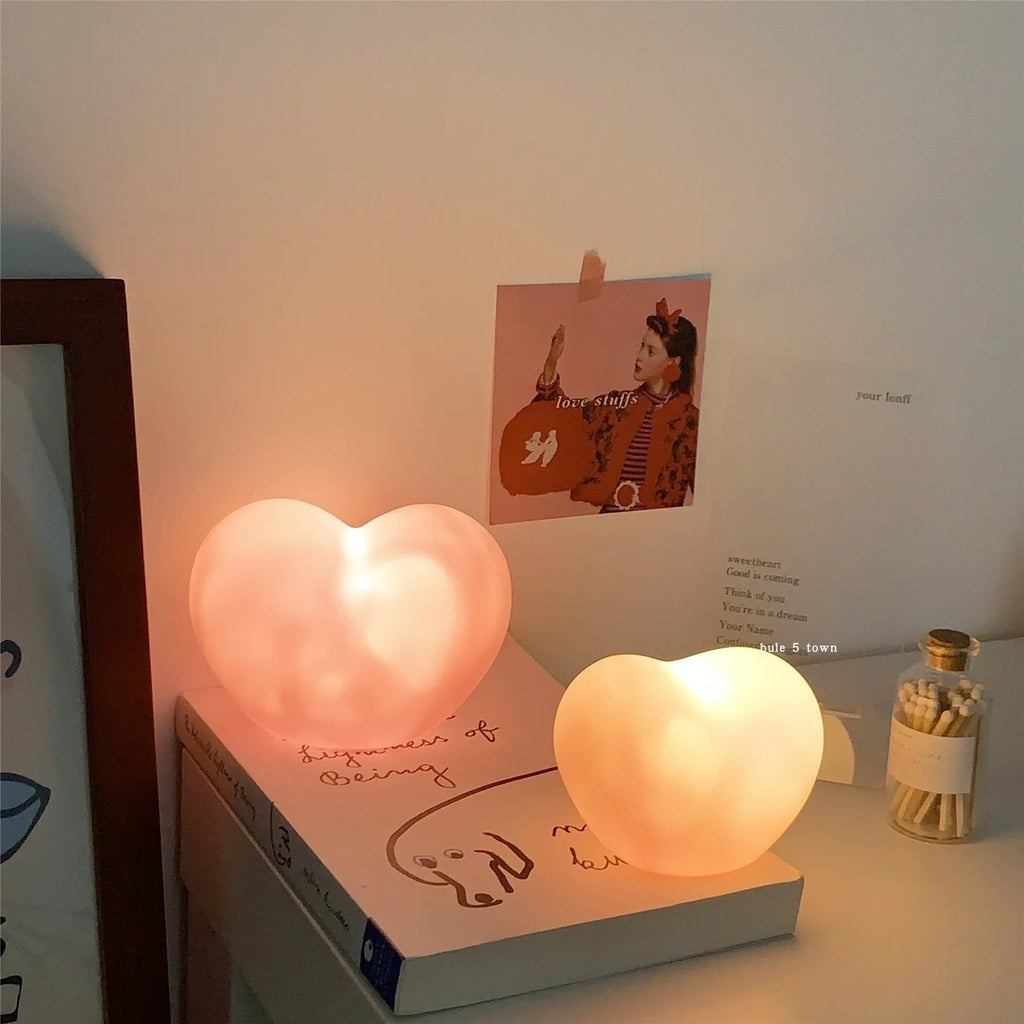 Vinyl atmosphere lamp in pink and white colours showing small and large size options for decorative ambient lighting