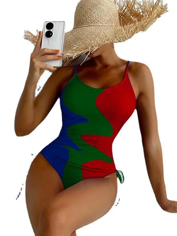 Women's sleeveless one-piece swimsuit in blue, purple, brown, or green colours for swimming sports
