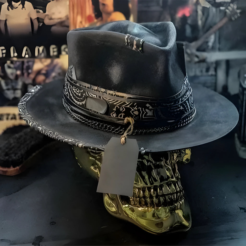 Handmade wool Halloween skull hat with a conical crown on a denim hat base.
