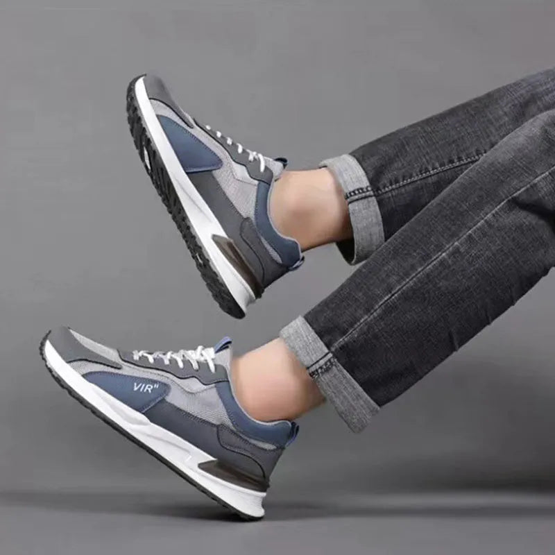Men's colour block mesh casual running shoes in black, flat heel and round toe design.