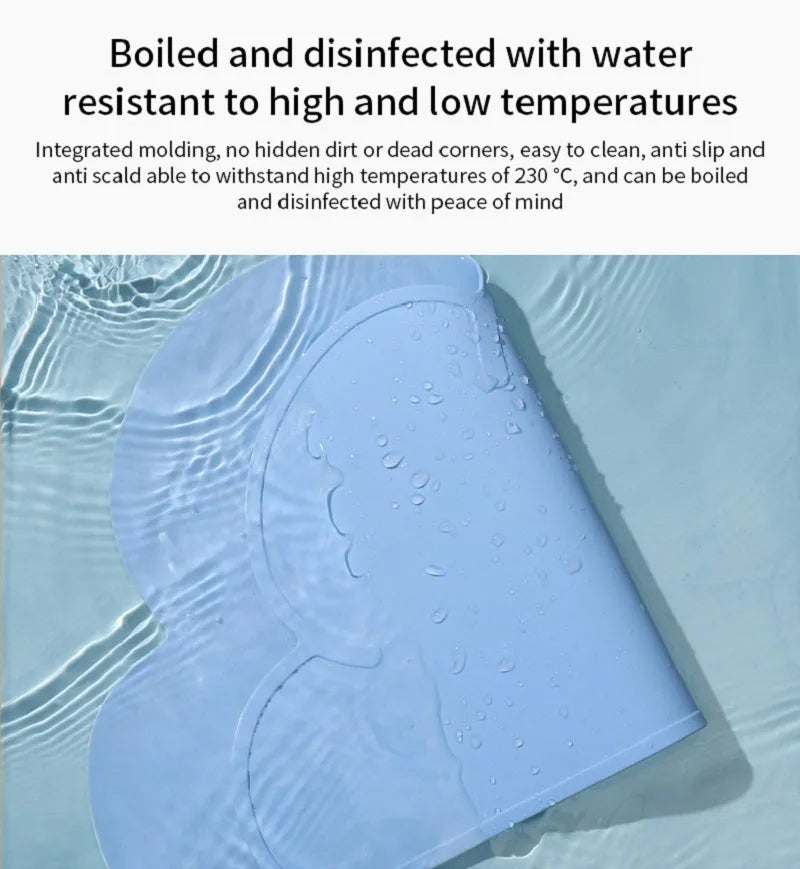 Blue silicone pet feeding mat with raised border for dog and cat food bowls
