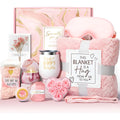 Aromatherapy gift set box containing scented candles, soaps, and bath accessories.