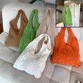 Women's retro style hollow knitted polyester tote bag in a solid colour, showing large open top and textured yarn material.
