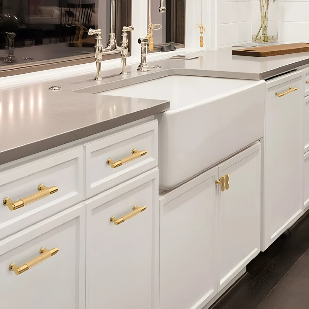 Brushed brass aluminium alloy furniture handle on a white background, showing hole spacing options.