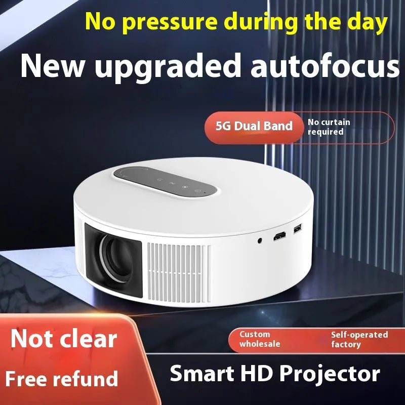 White HD 720p home cinema projector with remote control on a table
