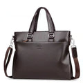 Black PU leather men's messenger shoulder bag with splicing design, 35x30x4cm.