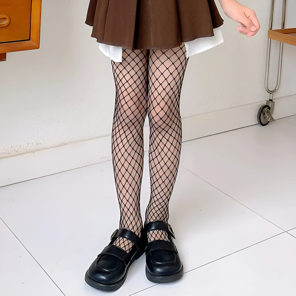 Women's black and white mesh pantyhose showing large, medium, and small fishnet patterns on leg