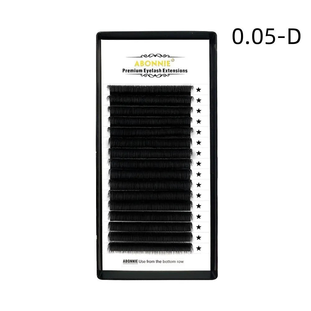 Pack of matte mink hair false eyelashes showing dense 16-row strip on a clear background.