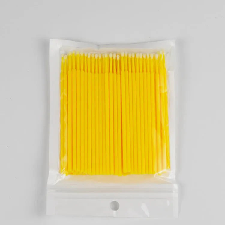 Disposable micro applicator brushes with colourful handles and bendable cotton swabs for makeup and eyelash extensions